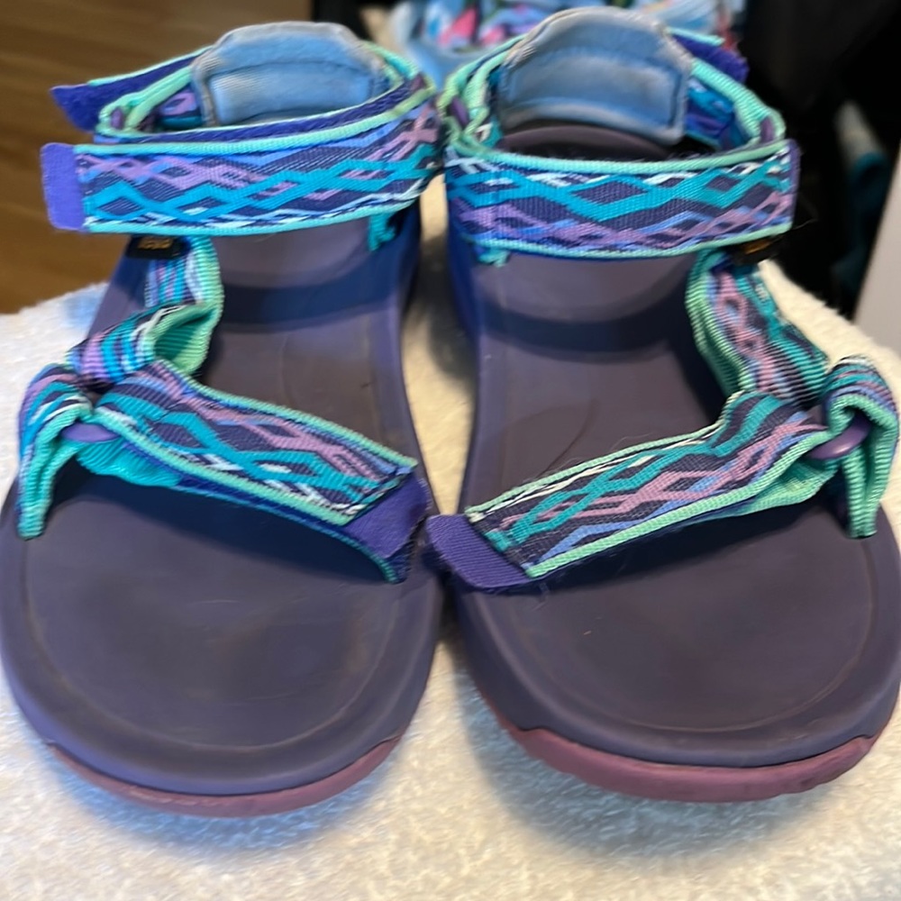 Teva size 4 sandals. Worn very little. Clean, no rips,tears or stains.